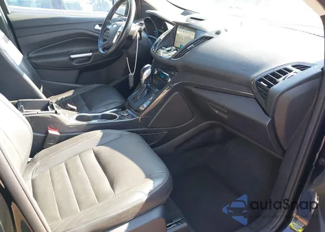 2016 Ford Escape Titanium z USA, uszkodzony, nr VIN 1FMCU9J96GUB20483